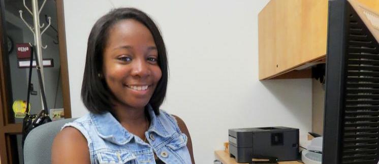 SIU Student smiling at camera